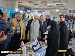 چهارمین روز از سی وسومین نمایشگاه بین المللی قرآن کریم باشعار ایران درپناه قرآن درغرفه دانشگاه ملی مهارت 2