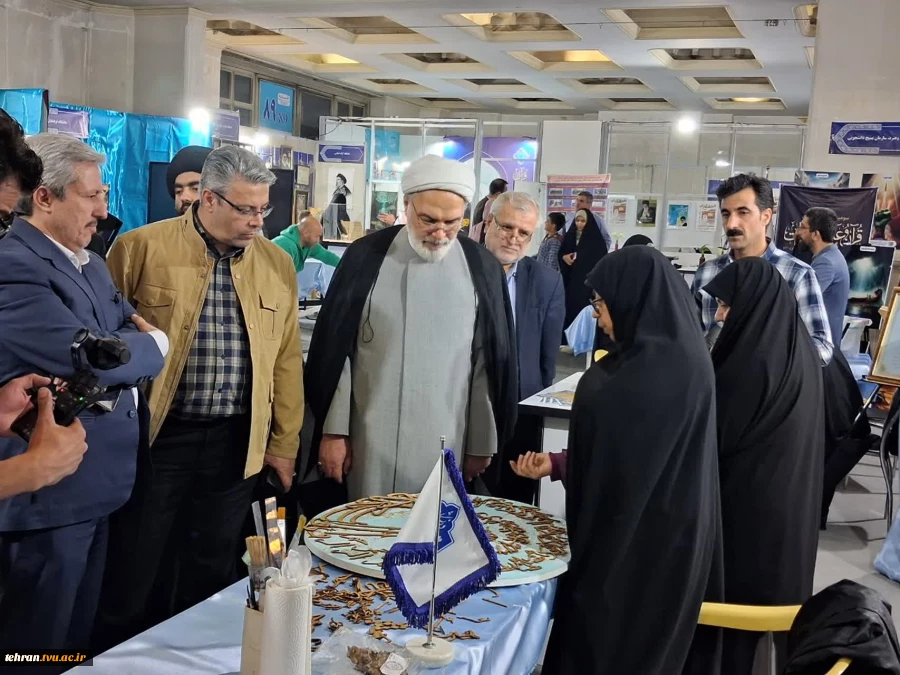 چهارمین روز از سی وسومین نمایشگاه بین المللی قرآن کریم باشعار ایران درپناه قرآن درغرفه دانشگاه ملی مهارت 2
