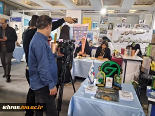 پنجمین روز از سی وسومین نمایشگاه بین المللی قرآن کریم باشعار ایران درپناه قرآن درغرفه دانشگاه ملی مهارت 7
