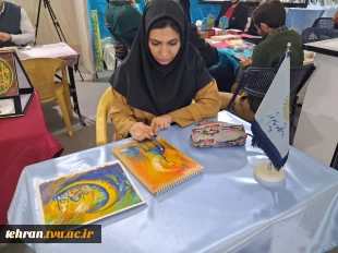 پنجمین روز از سی وسومین نمایشگاه بین المللی قرآن کریم باشعار ایران درپناه قرآن درغرفه دانشگاه ملی مهارت 11